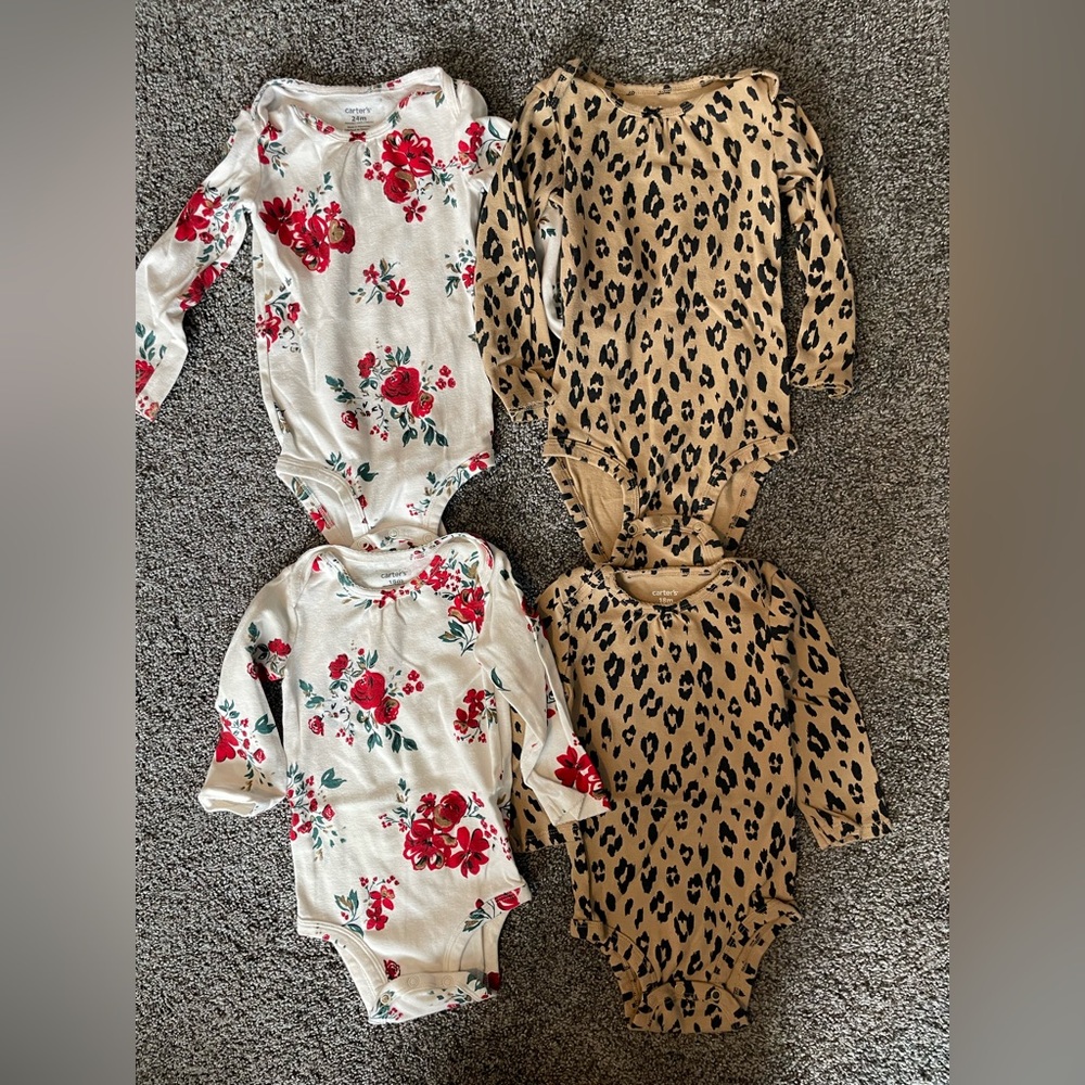 4 Carter's long sleeved Baby Onesies